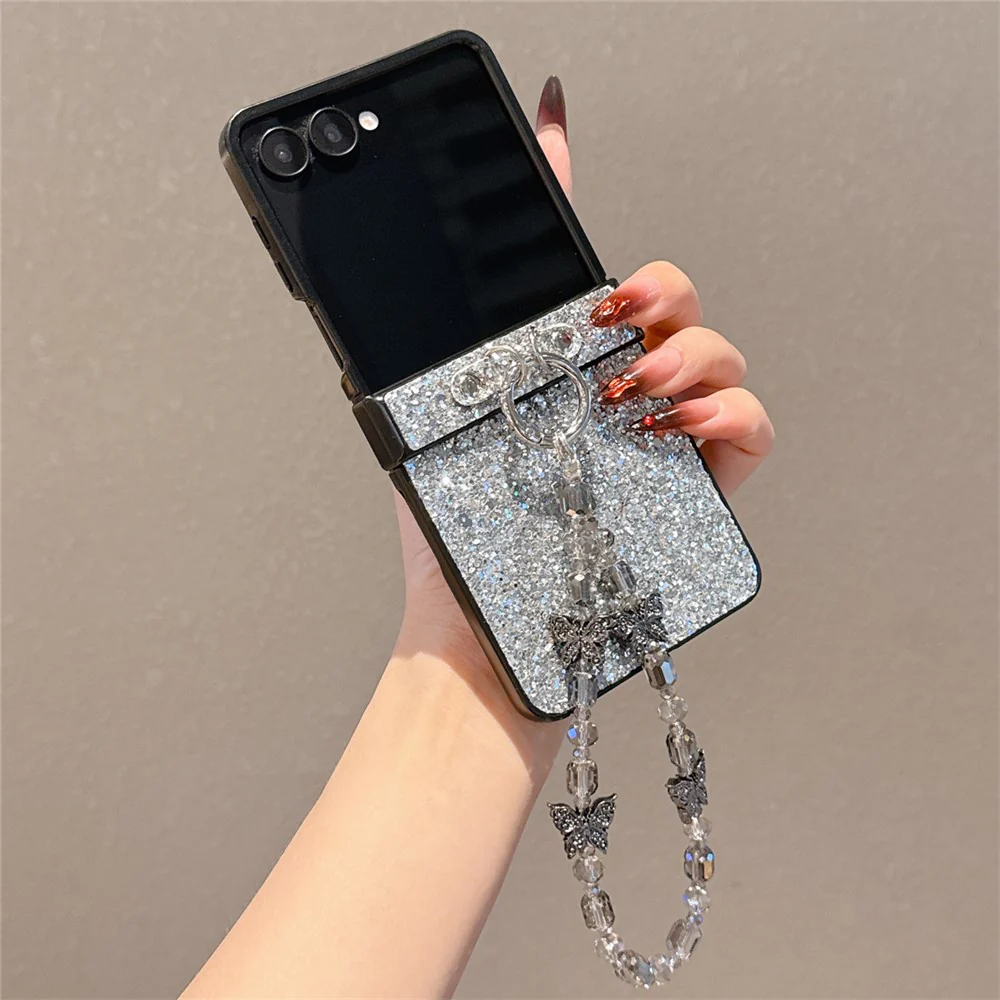 For Samsung Galaxy Z Flip7 5G Case Glitter Rhinestone TPU PC Phone Cover with Butterfly Wrist Strap - Silver